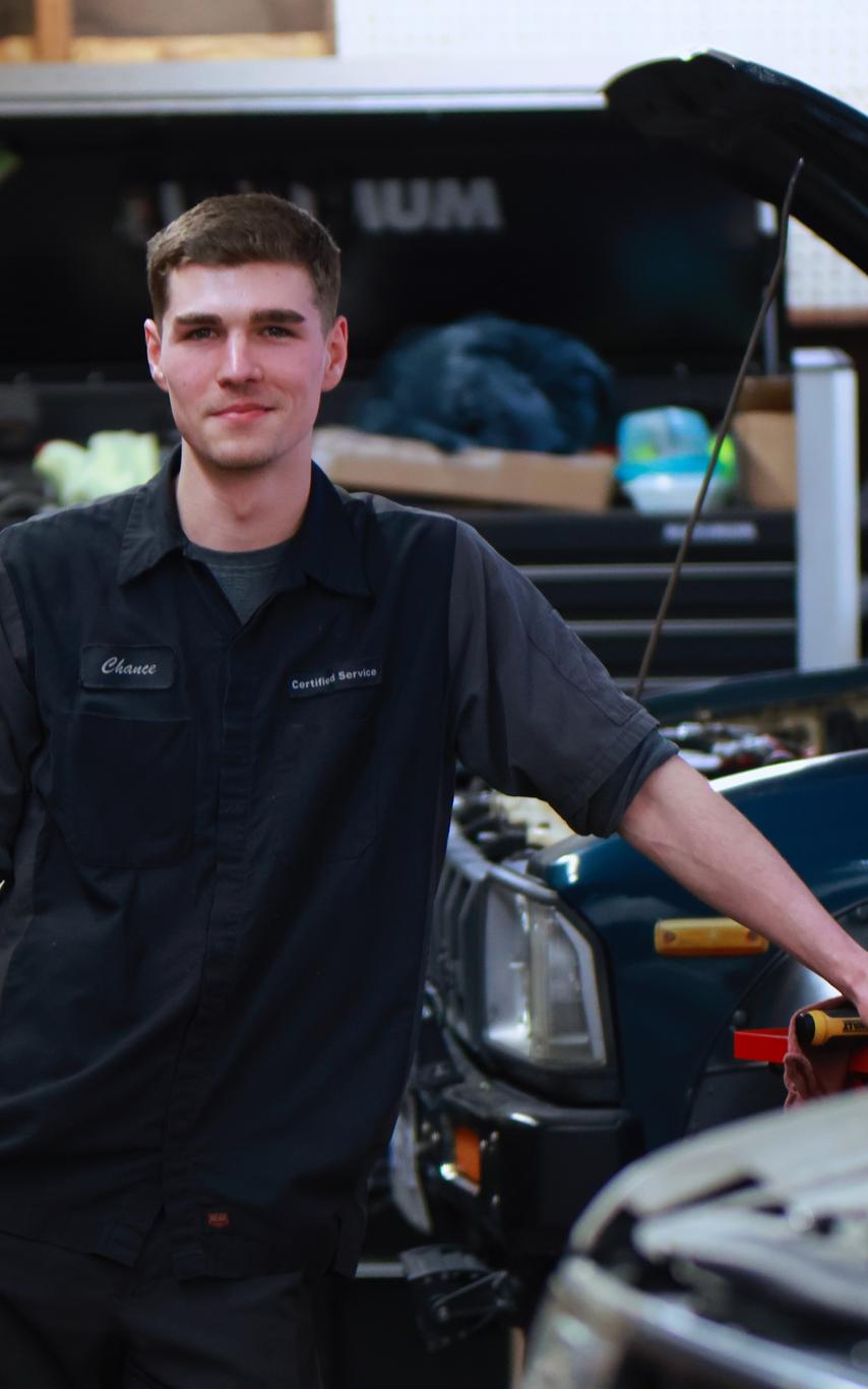 VIU Automotive Alumni Chance Rivest at work as an auto mechanic